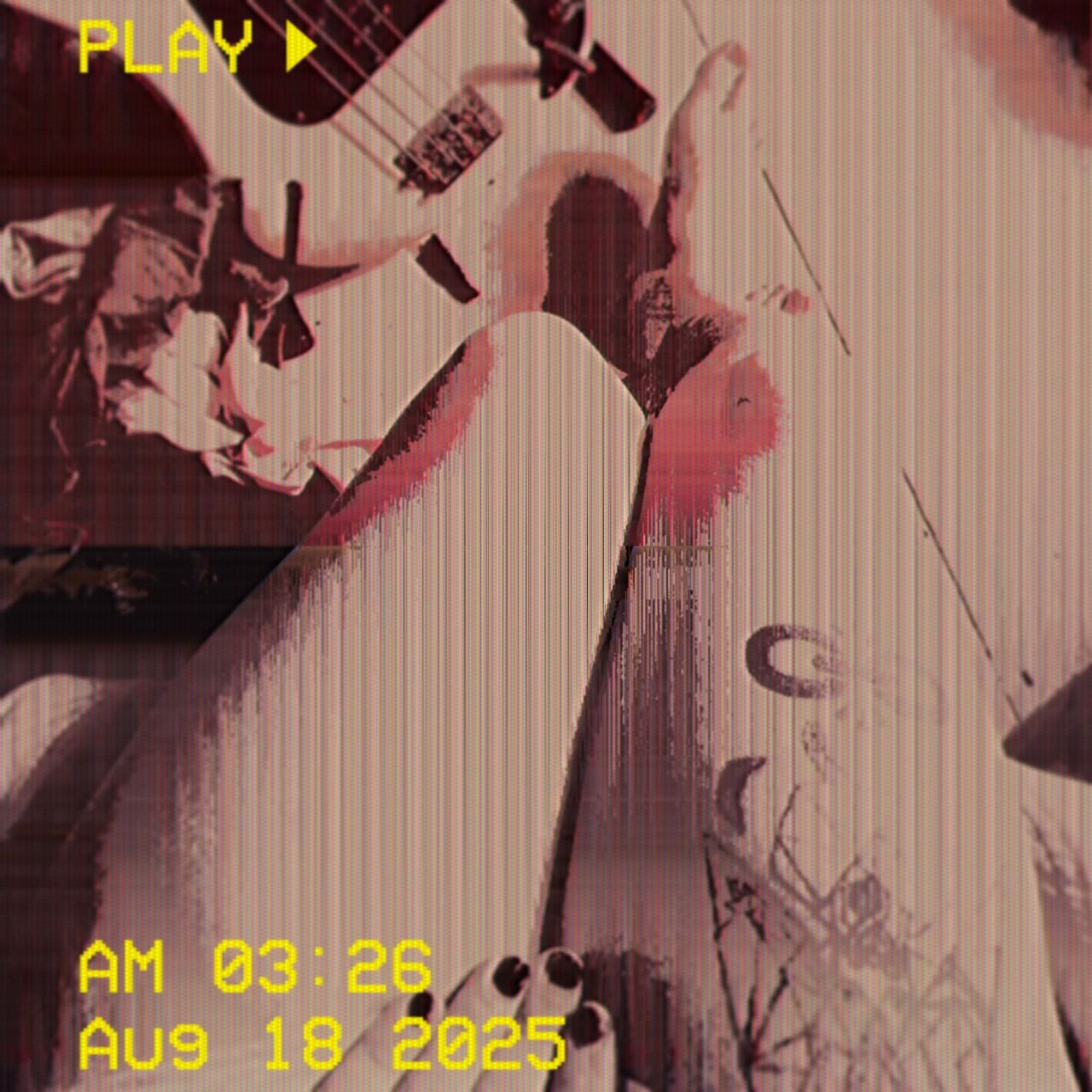 A glitched picture of my thighs with my bass on the background, the vhs overlay includes the date and time i finished the first draft